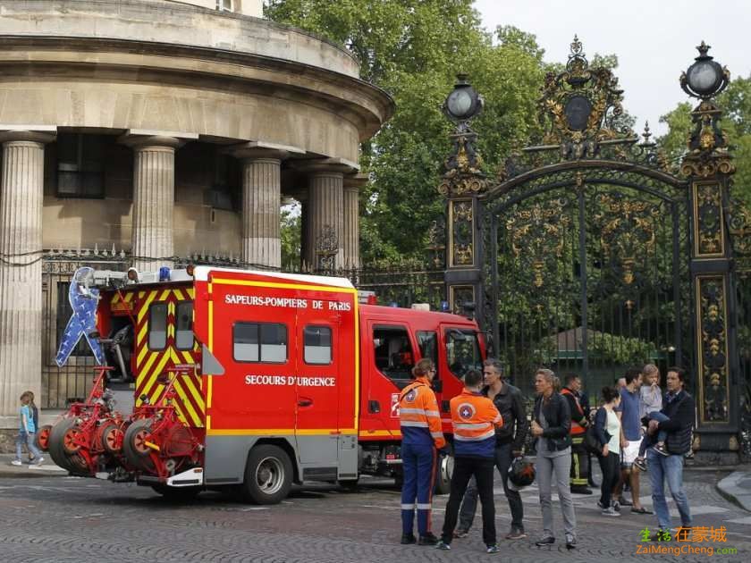 a-fire-truck-is-parked-at-the-entrance-to-monceau-parc-in-th.jpeg