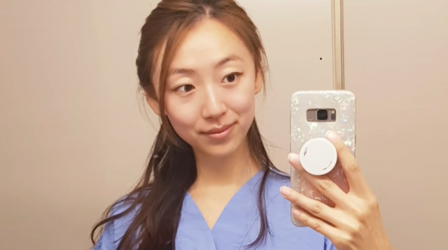 加拿大华裔女护士手撕反疫苗海报被骂回中国去-3.png