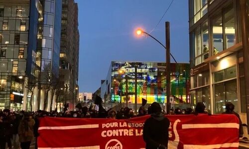 蒙特利尔市中心数百人游行抗议 反对COP15